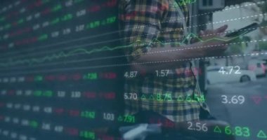 Animation of financial data processing over businessman using smartphone. Global business, finance, computing and data processing concept digitally generated video.
