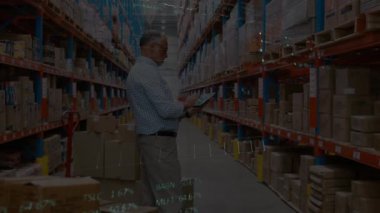 Animation of financial data processing over caucasian man working in warehouse. Global shipping, business, finance, computing and data processing concept digitally generated video.