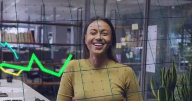 Animation of data processing over biracial businesswoman smiling in office. Global business and digital interface concept digitally generated video.