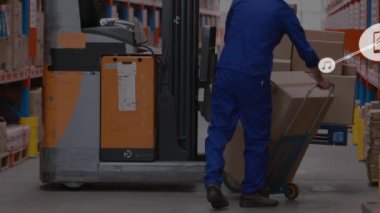 Animation of connected icons over caucasian workers placing boxes from pallet truck to forklift. Digital composite, multiple exposure, warehouse, communication, abstract and distribution concept.