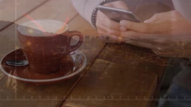 Animation of financial data processing over caucasian man using smartphone. Global business, finance, computing and data processing concept digitally generated video.