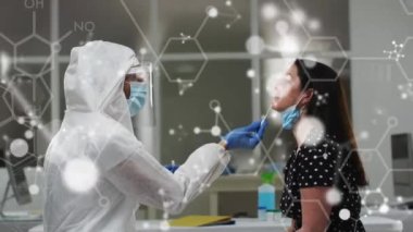Animation of molecules and chemical formula over diverse doctor and patient taking covid test. Global medicine, healthcare and digital interface concept digitally generated video.