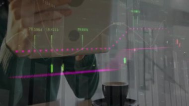 Animation of financial data processing over biracial man using tablet. Global technology, finances and digital interface concept digitally generated video.