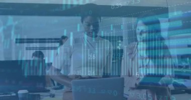 Animation of graphs, circles, bars, numbers, diverse female coworkers discussing reports on laptop. Digital composite, multiple exposure, office, business, teamwork, progress and technology concept.