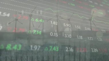 Animation of financial data processing over wind turbines. Global environment, sustainability, business, finance, computing and data processing concept digitally generated video.