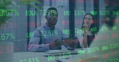 A group of business people are working together and discussing work in a modern office. Global connections business digital interface technology and networking concept digitally generated video.