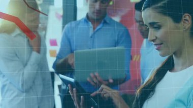 Animation of financial data processing with red lines over businesswoman using tablet. Global connections, business, finance, computing and data processing concept digitally generated video.