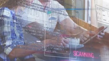 Animation of financial data processing over caucasian couple using tablet. Global lifestyle, finances and digital interface concept digitally generated video.