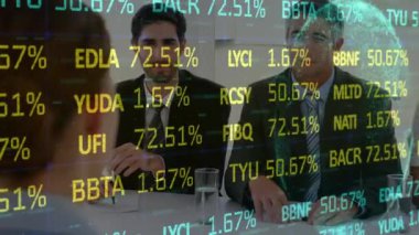 Animation of trading board, numbers and globe on diverse manager taking interview of woman in office. Digital composite, multiple exposure, stock market, globalization and discussion concept.