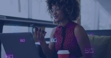 Animation of 6g texts over african american woman using smartphone. Global business and digital interface concept digitally generated video.