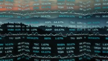 Animation of trading board over aerial view of silhouette of forest and mountains. Digital composite, multiple exposure, nature, stock market, investment, abstract and technology concept.