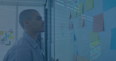 Animation of statistics and financial data processing over diverse business people. Global business, finance, computing and data processing concept digitally generated video.