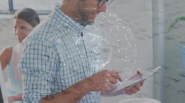 Animation of data processing over caucasian business people in office. Global business and digital interface concept digitally generated video.