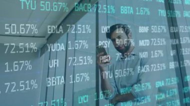 Animation of financial data processing over financial data and financial data processing. Global business connections data processing and technology concept digitally generated video.
