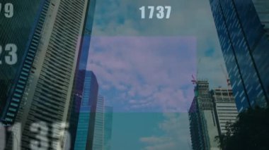 Animation of multiple changing numbers against low angle view of tall buildings. Computer interface and business technology concept