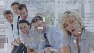 Animation of statistics and financial data processing over diverse business people. Global business, finance, computing and data processing concept digitally generated video.