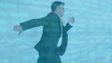 Animation of data processing over caucasian businessman running. Global business, finance, computing and data processing concept digitally generated video.