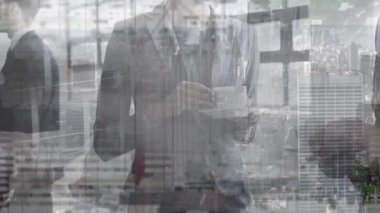 Animation of caucasian coworkers having conversation while drinking tea on cityscape in background. Digital composite, multiple exposure, teamwork, architecture, skyscraper and communication concept.