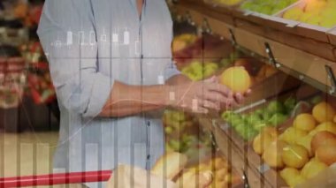 Animation of financial dat processing over caucasian man shopping. Global shopping, business, finance, computing and data processing concept digitally generated video.