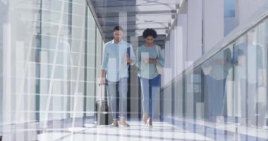 Animation of financial data processing over diverse business people discussing work at office. Global business, finances and digital interface concept digitally generated video.