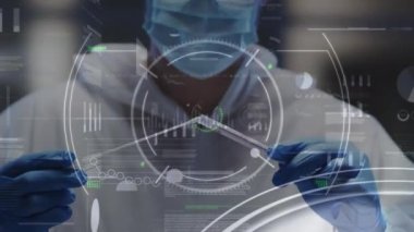 Animation of data processing over caucasian doctor taking covid test. Global medicine, healthcare and digital interface concept digitally generated video.
