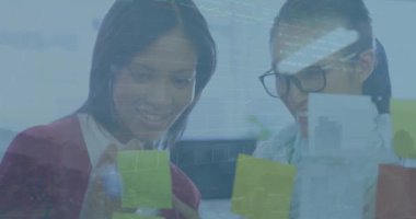 Animation of statistics and financial data processing over diverse business people. Global business, finances, computing and data processing concept digitally generated video.