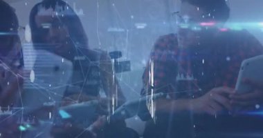 Animation of icons and data processing over diverse business people in office. Global business, finance, computing and data processing concept digitally generated video.