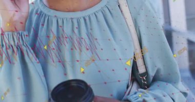 Animation of financial data processing over african american businesswoman talking on smartphone. Global business, finances and digital interface concept digitally generated video.