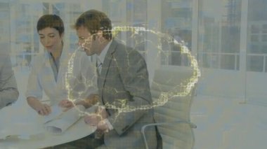 Animation of brain and shapes over caucasian business people in office. Global business and digital interface concept, digitally generated video.