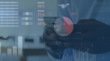 Animation of financial data processing over african american man using smartphone. Global technology, finances and digital interface concept digitally generated video.