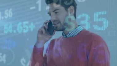 Animation of stock market over caucasian businessman using smartphone. Global business, finances and digital interface concept digitally generated video.
