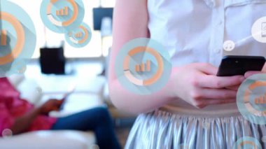 Animation of network of connections with icons over woman using smartphone. Global networks, business, finance, computing and data processing concept digitally generated video.