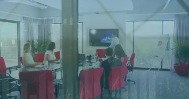 Animation of graphs over diverse male manager explaining report to coworkers on television screen.