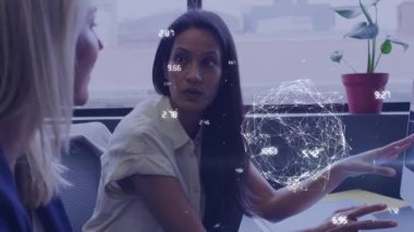 Animation of globe of connections with data processing over diverse business people at office. Global business, connections and digital interface concept digitally generated video.