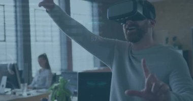 Animation of financial data processing over caucasian businessman using vr headset in office. Global networks, computing, business, finance and data processing concept digitally generated video.