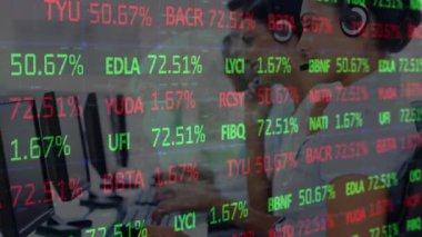 Animation of financial data processing over diverse business people using phone headsets in office. Global business, finance, computing and data processing concept digitally generated video.