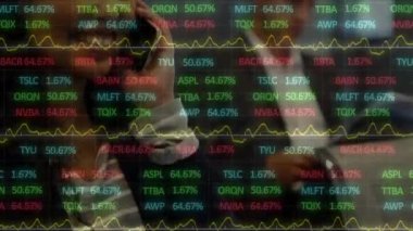 Animation of stock market data processing over biracial businesswoman talking on smartphone. Global economy and business technology concept