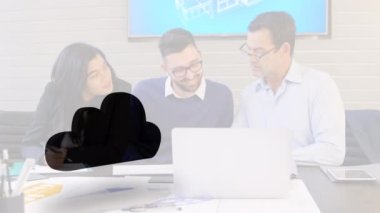 Animation of cloud icon over diverse business people in office. Global business and digital interface concept digitally generated video.