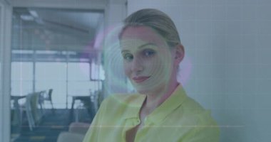 Animation of data processing over caucasian businesswoman working in office. Global business and digital interface concept digitally generated video.