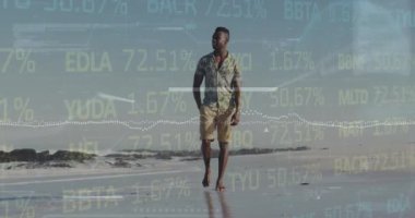 Animation of financial data processing over man on beach. Global holiday, finance, computing, connections and data processing concept digitally generated video.