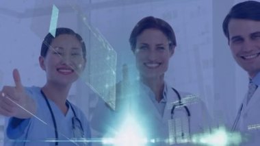 A team of medical professionals gives a thumbs-up to the camera, indicating approval or satisfaction. Meanwhile, an animation of various statistics scrolls across the screen in the background.