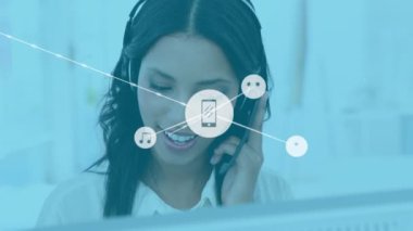 Animation of network of connections with icons over biracial woman working in call center. Global business, connections and digital interface concept digitally generated video.