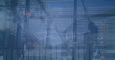 Animation of financial data processing over cityscape. Global business, finance, computing, digital interface and data processing concept digitally generated video.