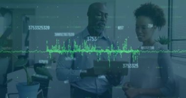 Animation of financial data processing and numbers over business people in office. Global business, finance, computing, connections and data processing concept digitally generated video.
