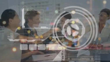 Animation of interface with data processing over two diverse businesswoman shakings hands at office. Computer interface and business technology concept