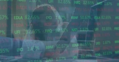 Animation of financial data processing over diverse business people working at office. Global finances, business and digital interface concept digitally generated video.