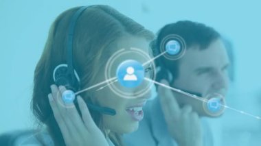 Animation of network of connections with icons over diverse business people using phone headsets. Global business, finance, computing and data processing concept digitally generated video.