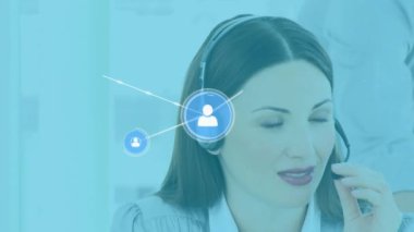 Animation of network of connections with icons over biracial businesswoman using phone headset. Global business, finance, computing and data processing concept digitally generated video.