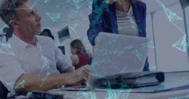 Animation of network of connections over diverse business people working at office. Global business, connections and digital interface concept, digitally generated video.