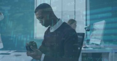 Animation of financial data processing over african american businessman in office. Global business, finance, computing and data processing concept digitally generated video.
